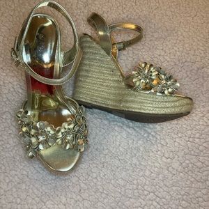 Carlos Santana wedges with flowers & rhinestones.